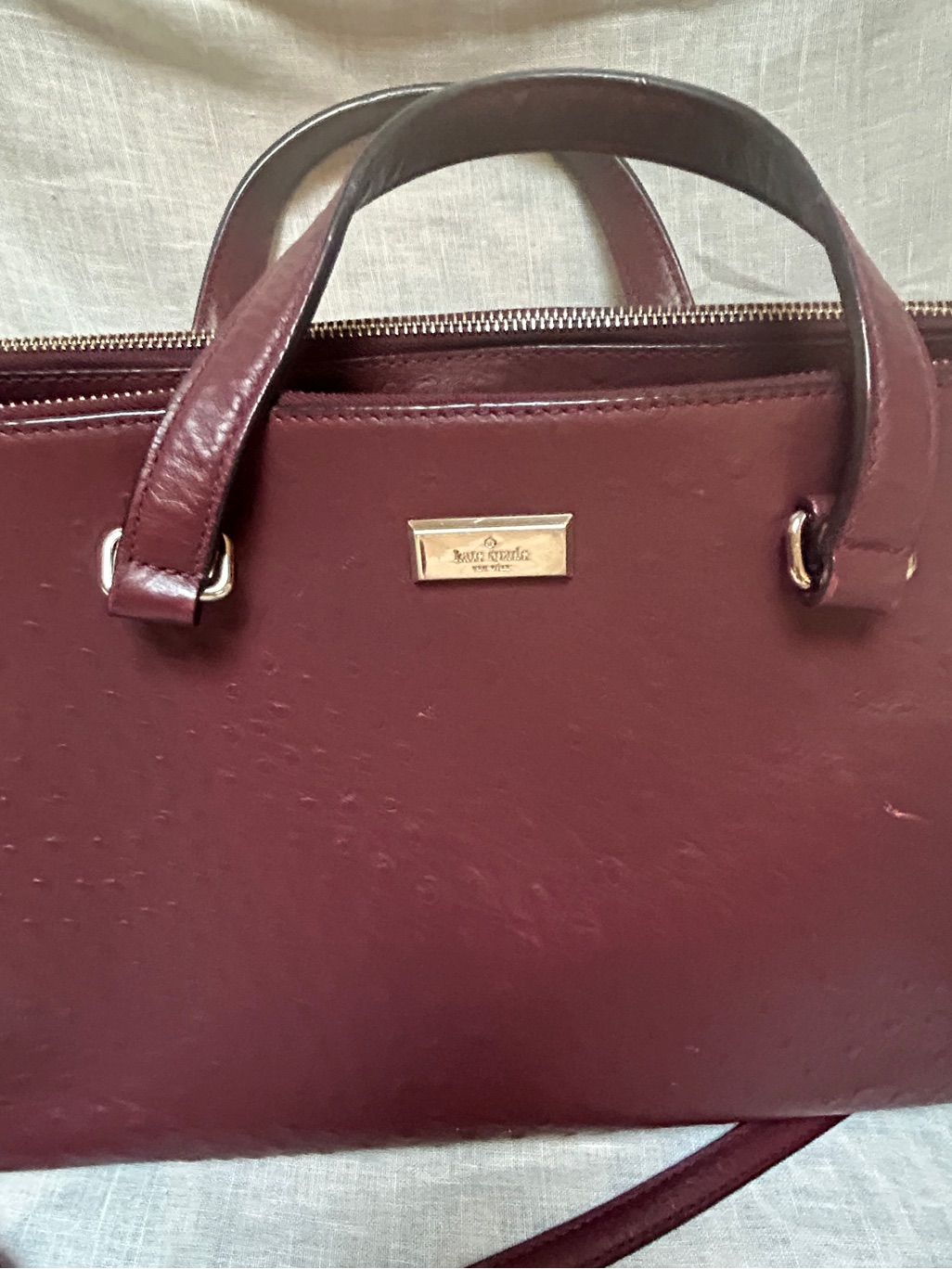 Kate Spade Gold-Plaque Clutch In Burgundy